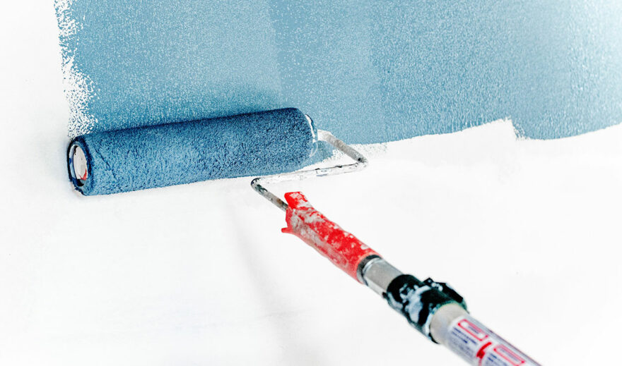 Painting Painting a wall with a roller