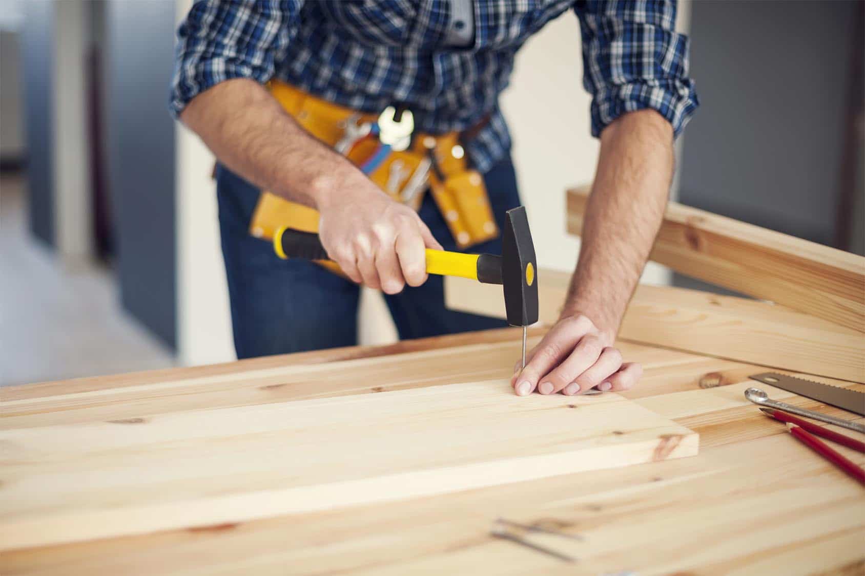 Handyman using his carpentry skills