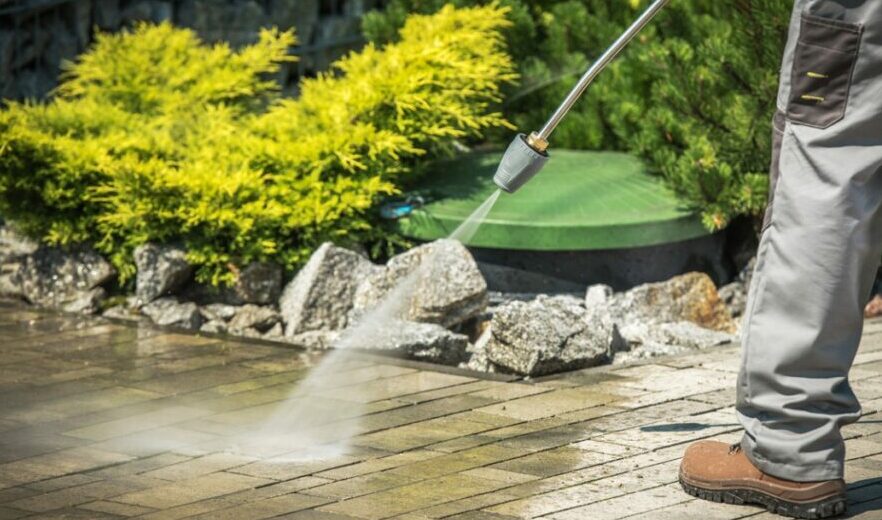 Power washing a driveway